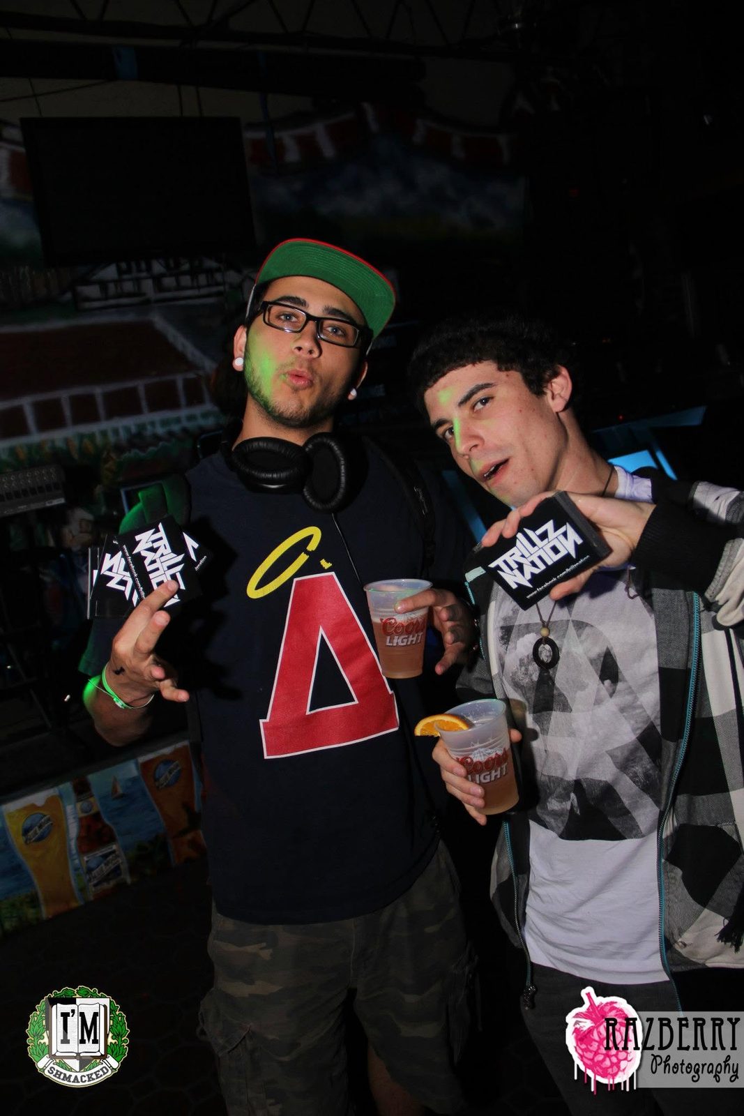 Derek holding Trillz Nation promo cards